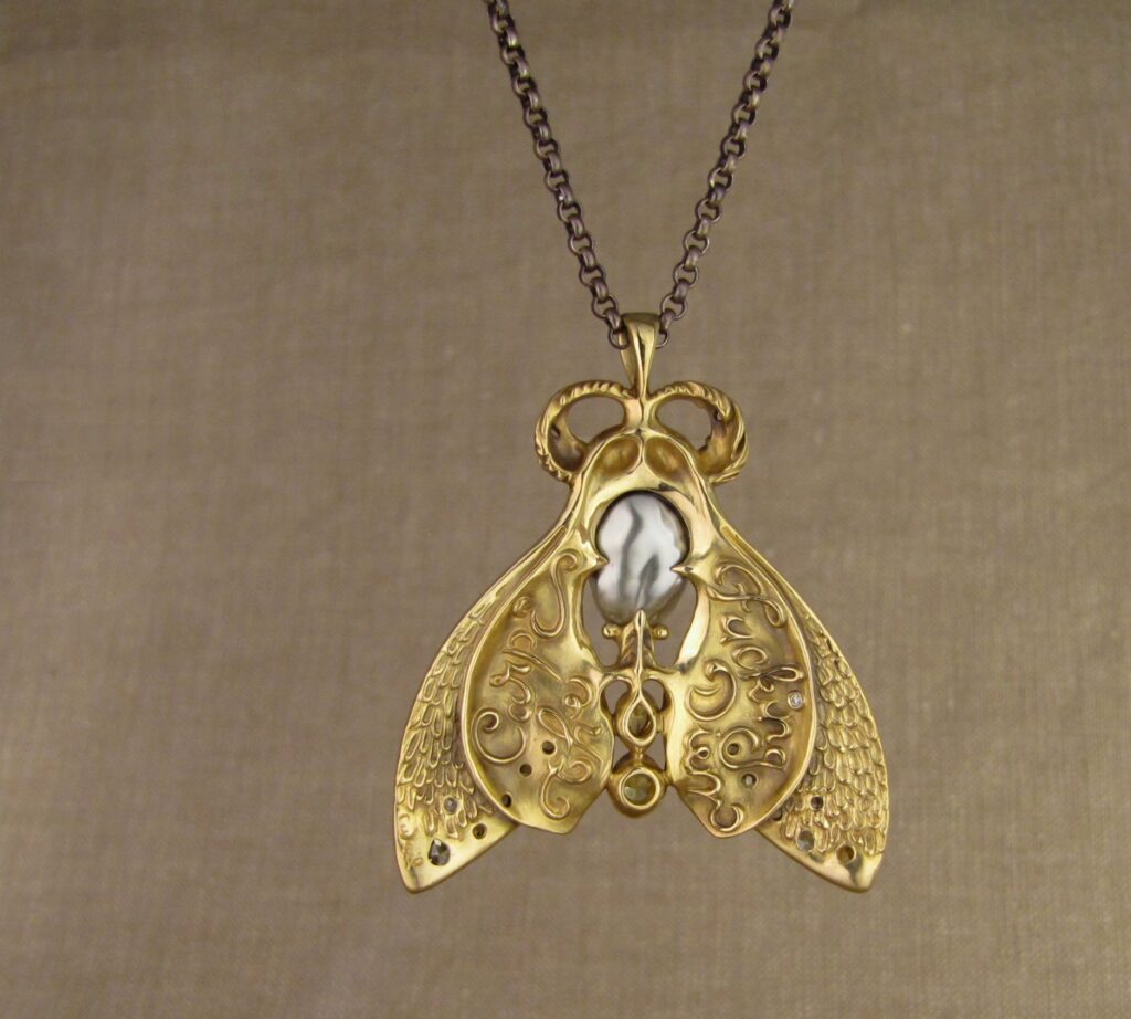 Custom designed & hand-carved Death's Head Hawkmoth Memento Mori pendant. 18K, carved skull keshi pearl, natural fancy color diamonds. cheyenne weil