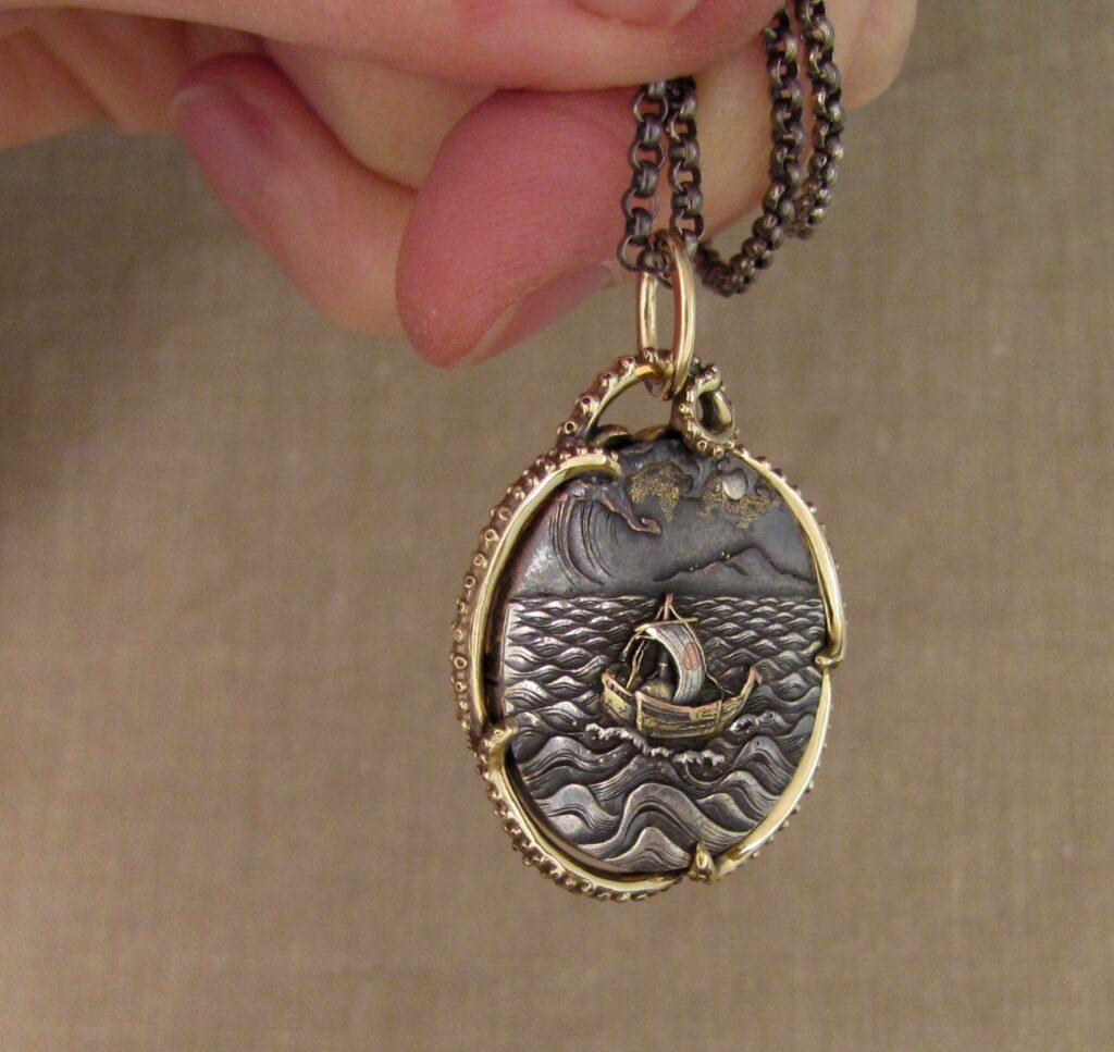 Custom designed & hand-carved tentacled Japanese Shakudo pendant in 14K. Cheyenne Weil